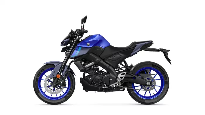 Side view of a blue sport motorcycle with black accents and blue rims against a white background
