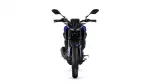Front view of a blue sport motorcycle on a white background, showing handlebars, dual headlights, and front tire.