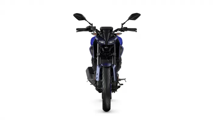 Front view of a blue sport motorcycle on a white background, showing handlebars, dual headlights, and front tire.