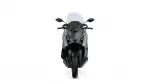 Front view of a modern sport motorcycle with a clear windscreen, dual headlights, and side mirrors visible on either side.