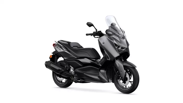 Gray Yamaha sport scooter with a large windshield, shown from a front-right side view