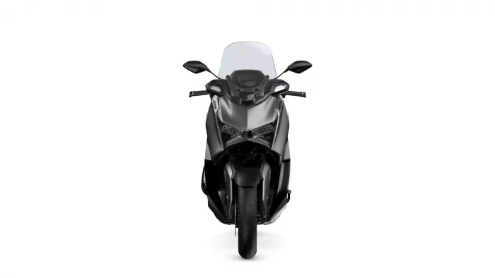 Front view of a black sport motorcycle with a tall windshield and angular LED headlights