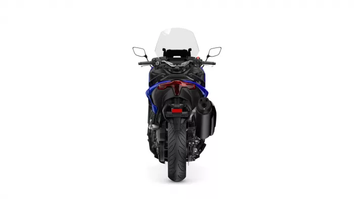 Rear view of a blue and black sport motorcycle with a tall windscreen and red taillight cap, seen from behind in this product photo.