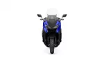 Front-on view of a blue sport motorcycle with a tall windshield and side mirrors.