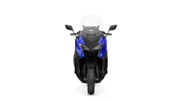 Front-on view of a blue sport motorcycle with a tall windshield and side mirrors.