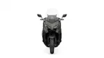 Front-on view of a gray adventure motorcycle with a tall windscreen and dual headlights.