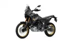 Yamaha Tenere 700 World Raid adventure motorcycle in matte black with gold wheels, shown in profile on a white background.