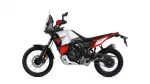Side view of a white and red Yamaha Tenere 700 World Raid adventure motorcycle with tall windscreen.