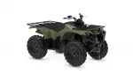 Green Yamaha ATV (Kodiak) with front and rear cargo racks and large off-road tires, angled view