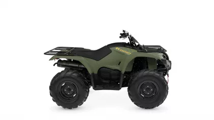 Olive green Yamaha ATV with front and rear cargo racks, large off-road tires, and black seat. Alternative 1