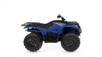 Blue Yamaha ATV with large off-road tires and front/rear racks, side branding reads Kodiak 700/400 model.