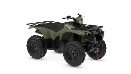 Olive-green all-terrain vehicle (ATV) with front and rear cargo racks and large knobby tires.