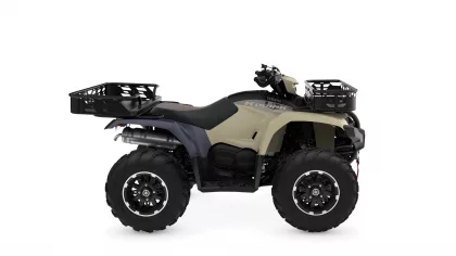 ATV with front and rear cargo baskets, beige and dark gray body, large off-road tires.