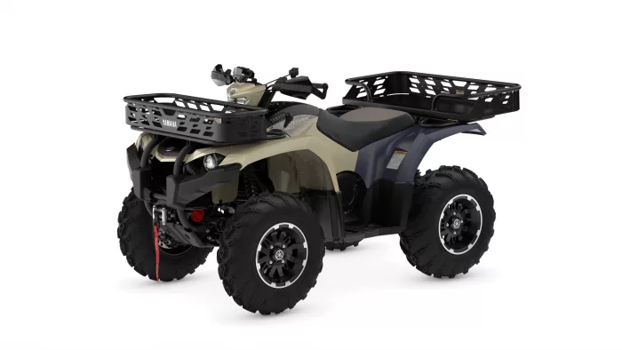 Yamaha ATV with wide front and rear cargo racks, beige and gray body, large off-road tires.