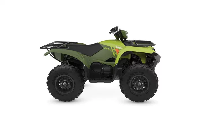 Green Yamaha Grizzly ATV shown in a side profile with front and rear cargo racks on a white background.