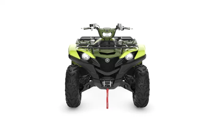 Front view of a lime-green ATV with large knobby tires, protective bumper, and a red tow rope hanging from the winch area at center.