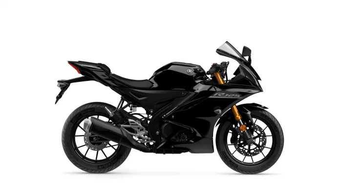 Side view of a glossy black Yamaha R125 sport motorcycle with gold front suspension forks