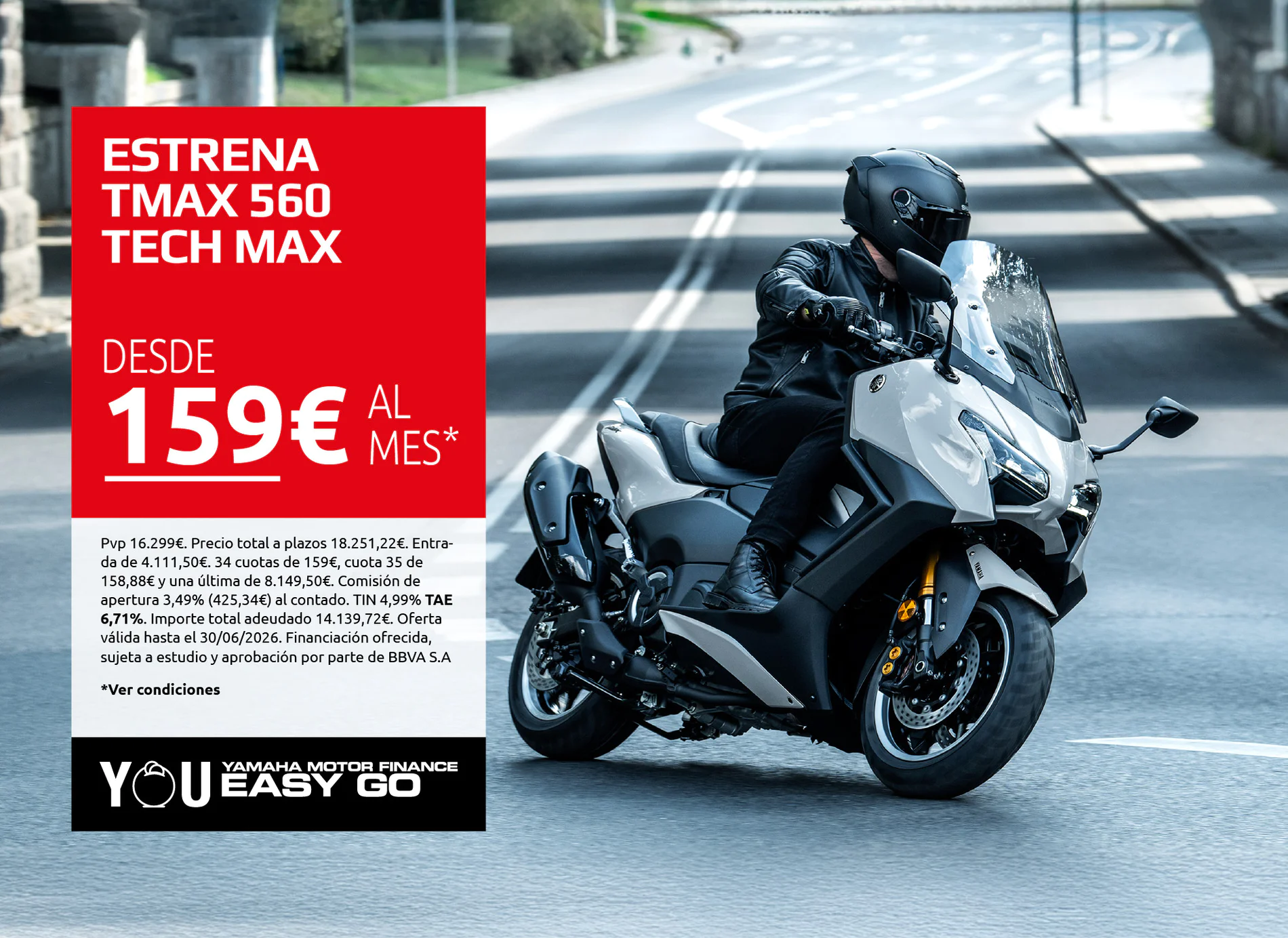 Motorcycle rider in black gear on a white Yamaha bike beside a large red ad panel reading 'ESTRENA TMAX 560 TECH MAX' and '159€ AL MES'.