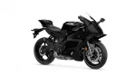 Black sport motorcycle on a white background, angled to show its aerodynamic fairings and front brake discs.