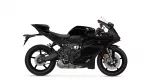 Side view of a black sport motorcycle with sharp fairings against a white background.