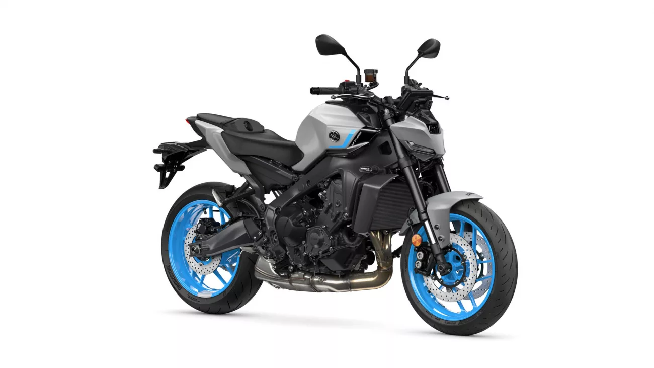 Gray Yamaha sport motorcycle with bright blue rims, shown in a three-quarter front-right view on a white background.