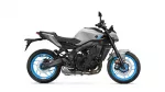 Left-side view of a gray and black sport motorcycle with bright blue rims against a white background, shows the engine and frame details.