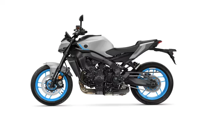 Side view of a gray sport motorcycle with bright blue rims and exposed mechanicals.