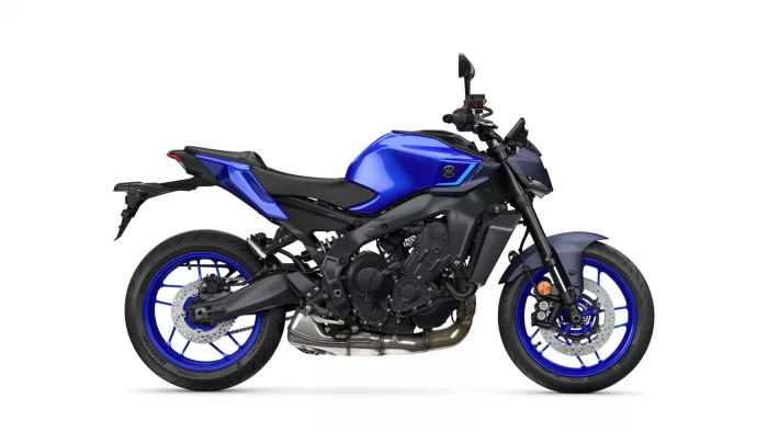 Blue Yamaha sport motorcycle shown in profile from the left side, with blue wheels and exposed engine.
