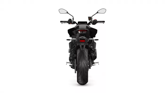 Rear view of a black sport motorcycle isolated on a white background, showing the taillight and mirrors above the handlebars behind the seat.
