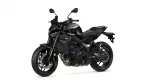 Black sport motorcycle shown from a front-right angle on a white background, highlighting its sleek, angular bodywork and exposed components.