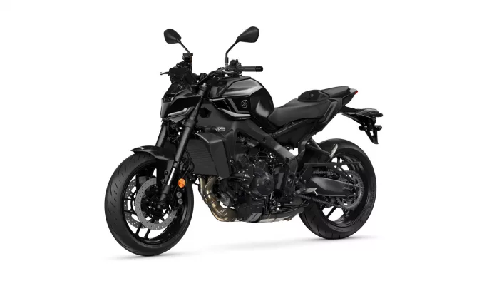 Black sport motorcycle shown from a front-right angle on a white background, highlighting its sleek, angular bodywork and exposed components.