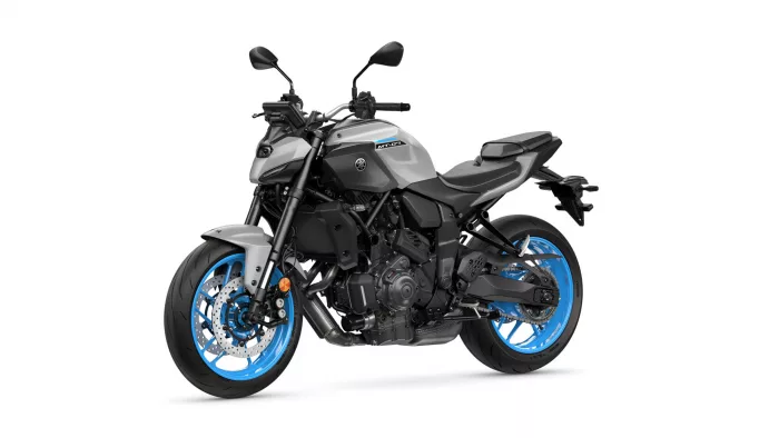 Yamaha MT-07 sport motorcycle in gray with blue rims, viewed from the front-left side.