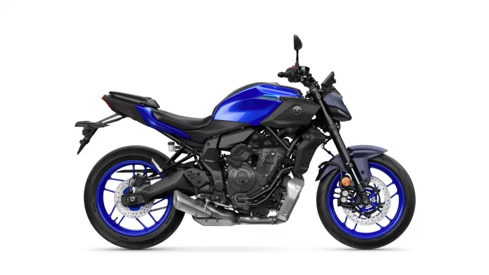 Blue Yamaha MT-07 sport motorcycle shown in a left-side profile with chrome exhaust and blue rims