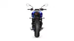 Rear view of a blue motorcycle showing tail light, seat, and rear tire against a white background