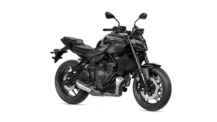 Black Yamaha MT-07 motorcycle shown from a front-right angle, highlighting its aggressive naked-bike design and dual disc front brakes.