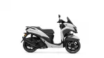 Profile view of a white Yamaha Tricity scooter with black seat and windshield, shown from the left side.