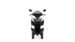 Front view of a white-and-black sport motorcycle with windshield and mirrors on either side