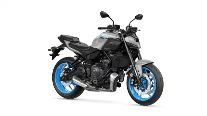 Silver and black Yamaha MT-07 sport motorcycle with blue alloy wheels, shown from the left side on a white background.