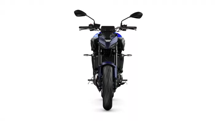 Front view of a blue sport motorcycle with dual headlights, mirrors, and a wide front tire.