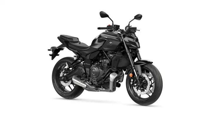 Black Yamaha MT-07 sport motorcycle, front-right angle, showing disc brakes and sleek bodywork.”','