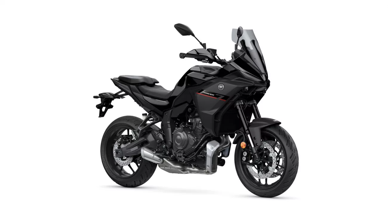 Black Yamaha sport motorcycle shown from the front-right, with a tall clear windscreen and aggressive angular fairing.