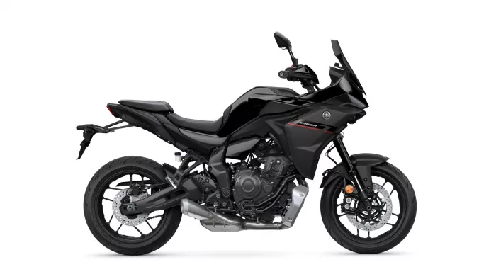 Black Yamaha Tracer sport-touring motorcycle in side view, showing windscreen and body fairings.