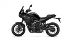 Black Yamaha Tracer sport motorcycle in profile view, showing the fairings, handlebars, and rear wheel on a white background.