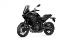 Black Yamaha Tracer sport motorcycle shown from the left side with windshield and aggressive angular fairings on a white background.