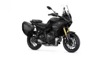 Black Yamaha Tracer GT sport-touring motorcycle with hard side panniers and tall windshield on a white background.