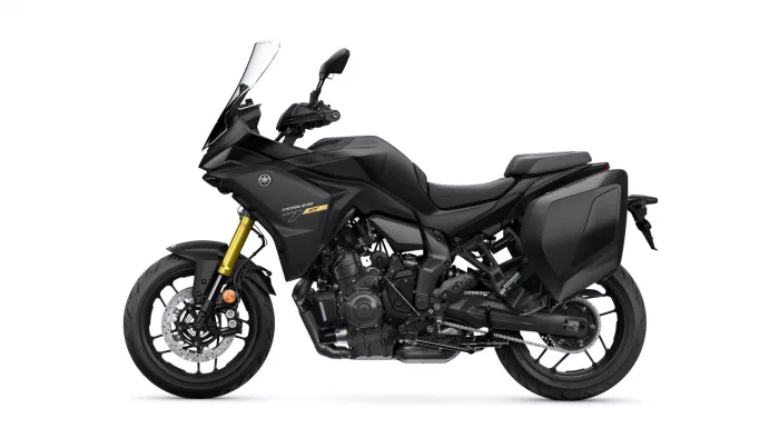 Black Yamaha Tracer 7 GT sport-tourer shown in profile with integrated side panniers and tall windscreen