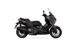 Black Yamaha XMAX sport scooter shown from the left side with a windshield in place