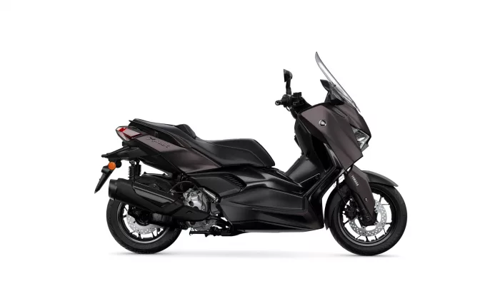 Black Yamaha XMAX sport scooter shown from the left side with a windshield in place