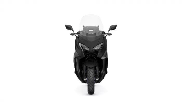 Front-on view of a black sport motorcycle with a clear windshield and angular headlights.