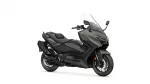 Sport-touring motorcycle in dark gray and black with a tall clear windshield, viewed from the side-right. Likely a Yamaha model.